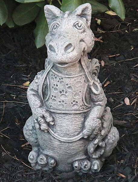 Dragon statue ready to go for his daily walk has a leash on collar sculpture